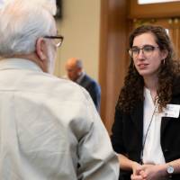 people talk at event